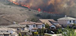 Southern California brush fire near houses